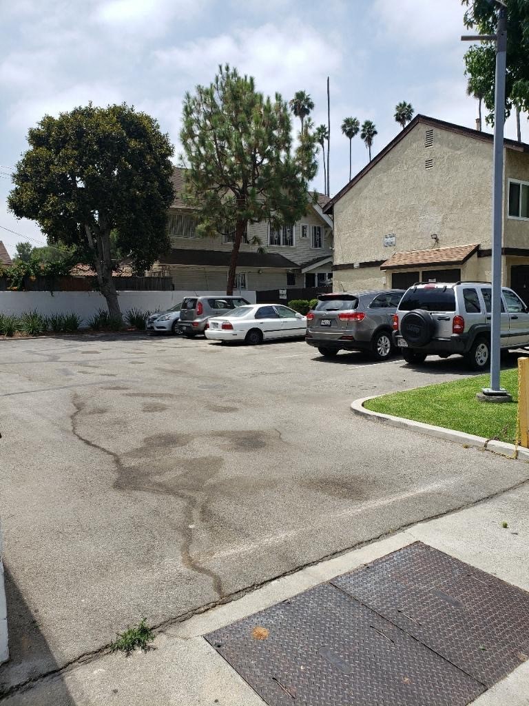 a parking lot with cars parked in it
